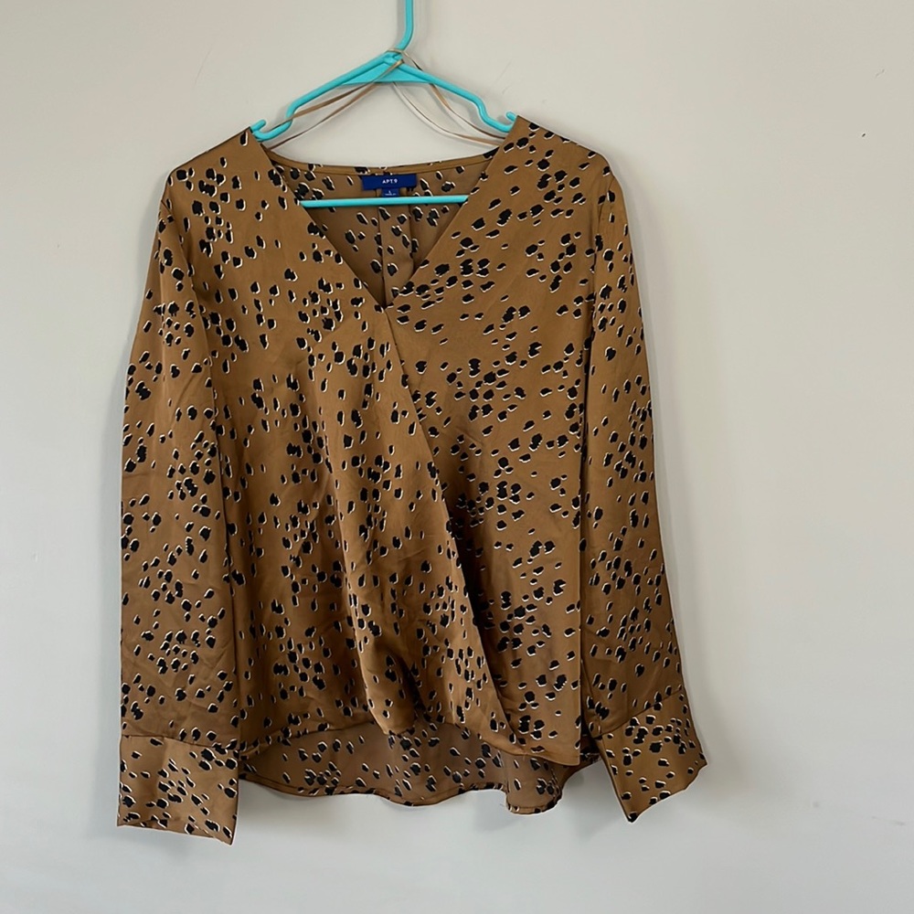 Cross front cheetah print blouse.
